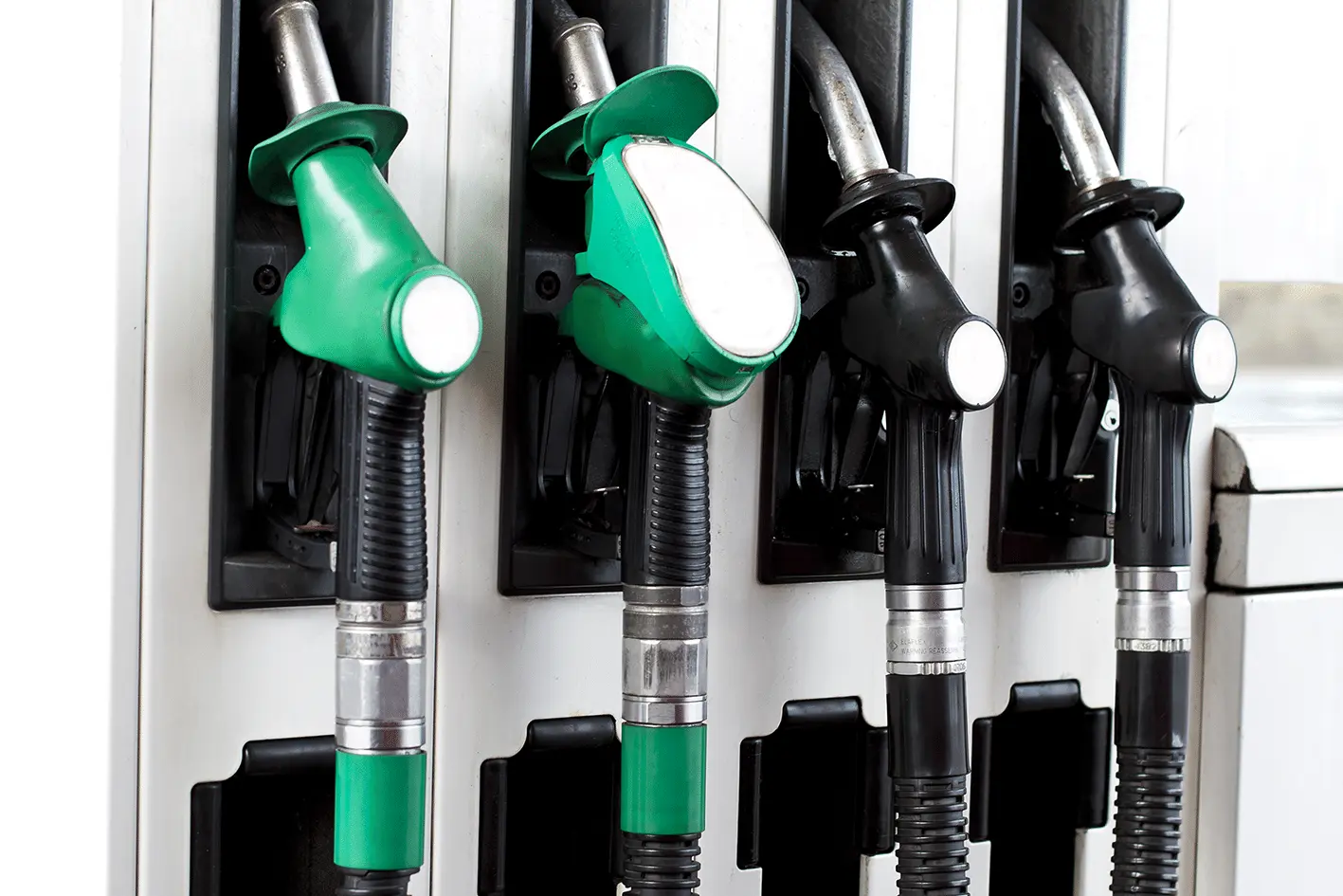 Closeup of 4 petrol pumps